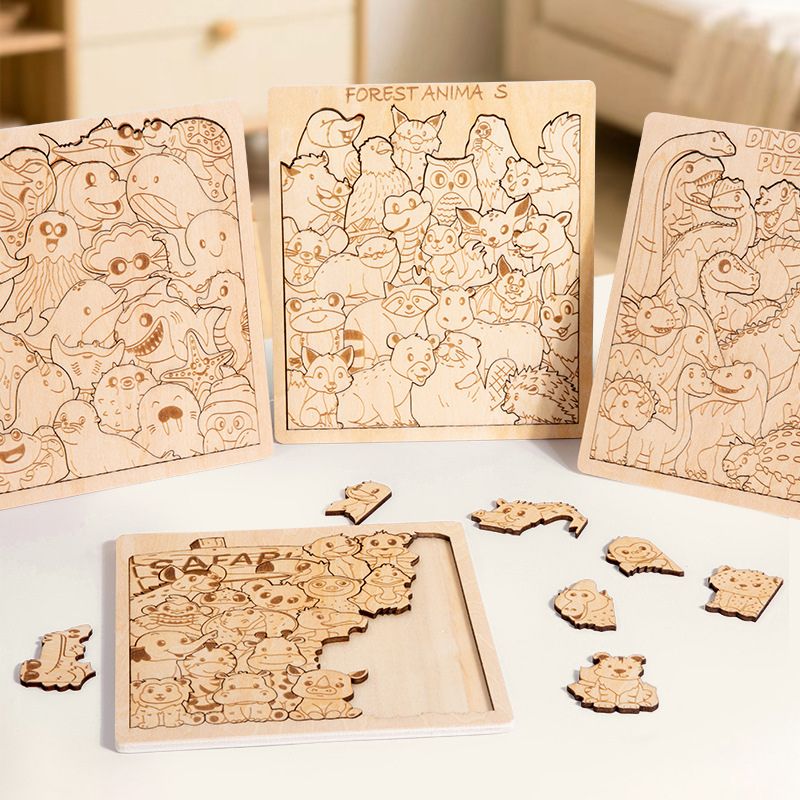 4 variantes puzzle bois gravé forêt dinosaures safari océan posées ensemble sur table - jeu logique enfant 5-10 ans - Atelier Puzzle